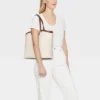 XL Cut Out Tote Handbag - A New Day™ 1 XL Cut Out Tote Handbag - A New Day™ -A NEW DAY Shop GUEST 0e63d638 00f9 4f23 80c9 b31db247db3a